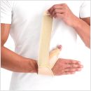 Dunimed duimbrace duimbandage polsbandage beige gedragen om rechterhand
