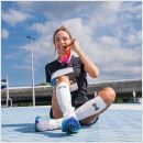 Herzog Sport Compressiekousen Pro in de kleur wit gedragen door hardloopwinnaar