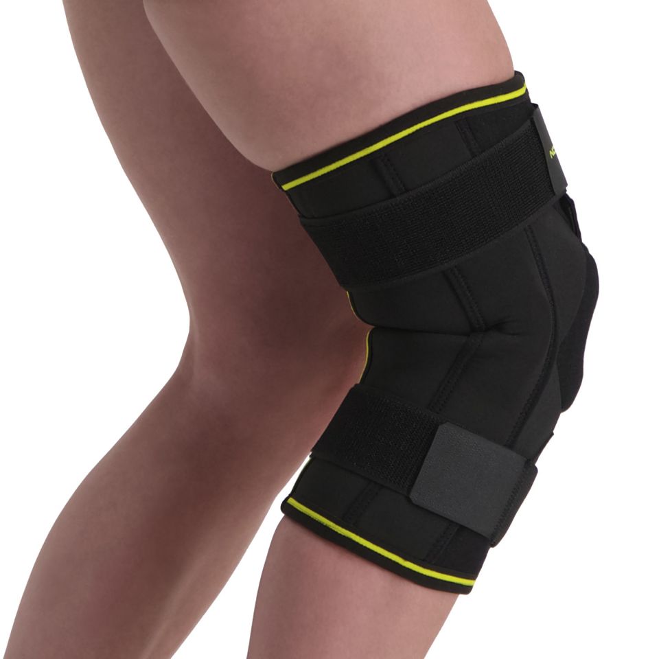 novamed scharnier kniebrace max met gekruiste banden klittenband strap losgetrokken